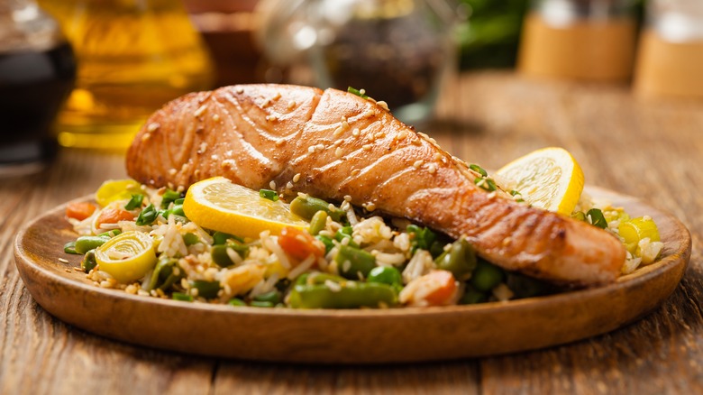 Salmon on top of rice salad 