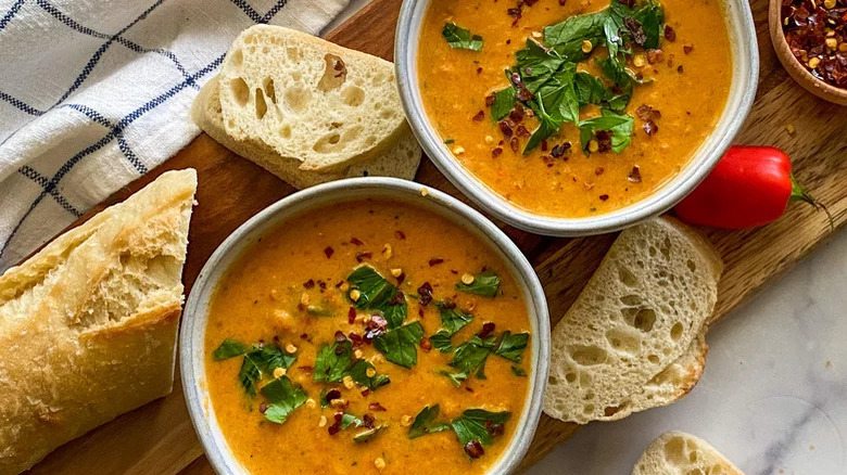 Bowls of red pepper soup