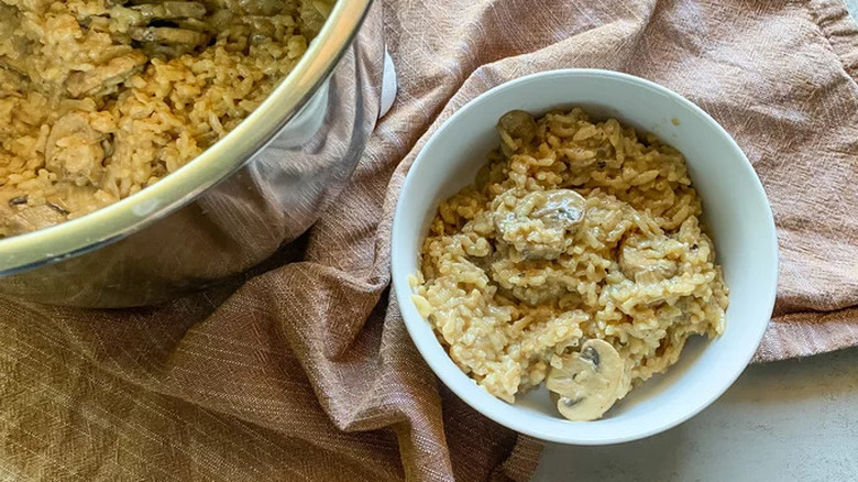 Mushroom risotto in blue bowl