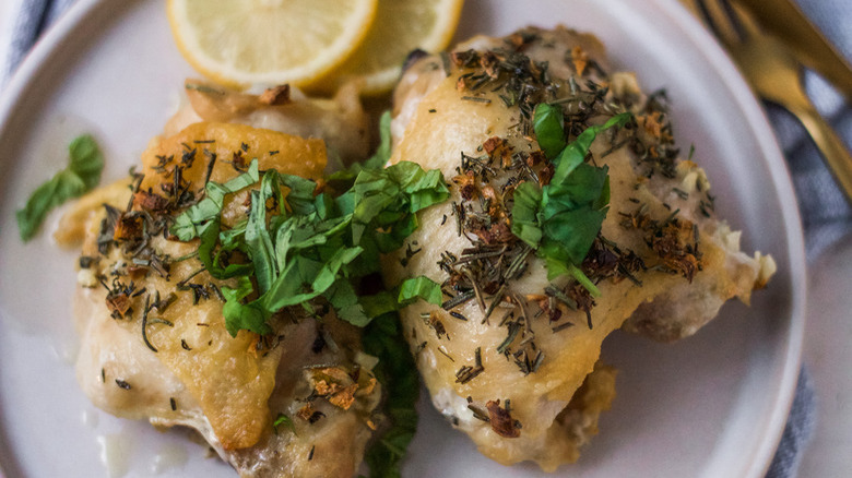 Italian chicken thighs on plate