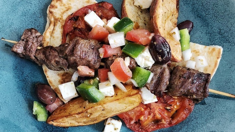 Lamb souvlaki with Greek salad