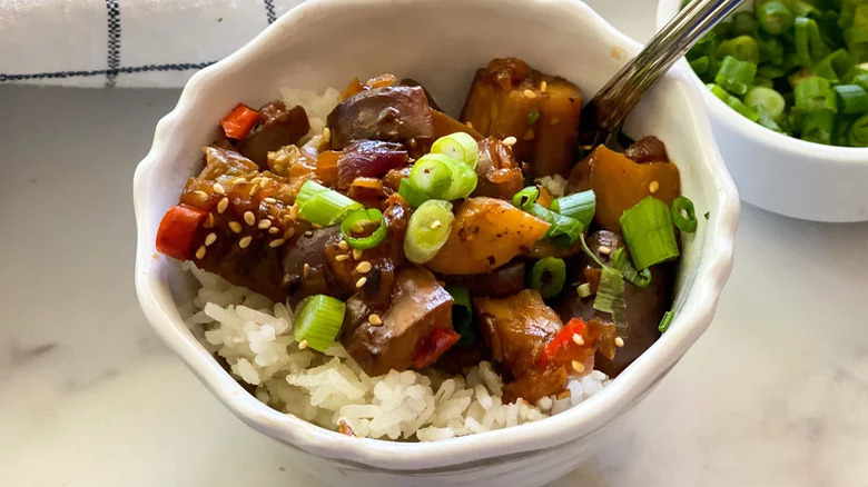 Spicy garlic eggplant atop rice