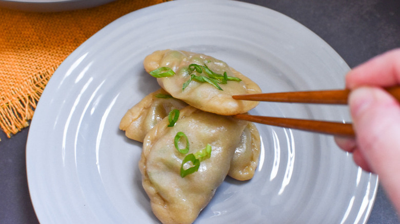 Steamed beef dumplings and chopsticks