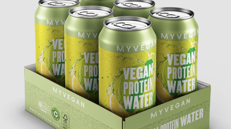 A case of six cans of Myvegan with white background