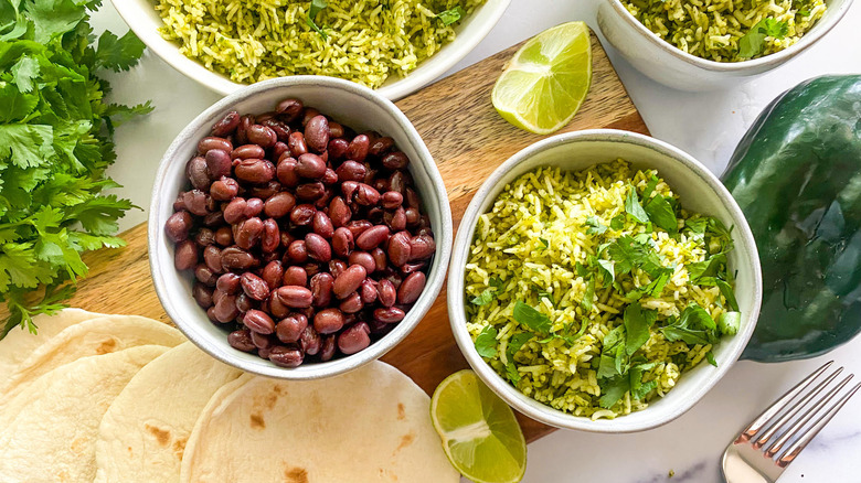 green rice, beans, and tortillas