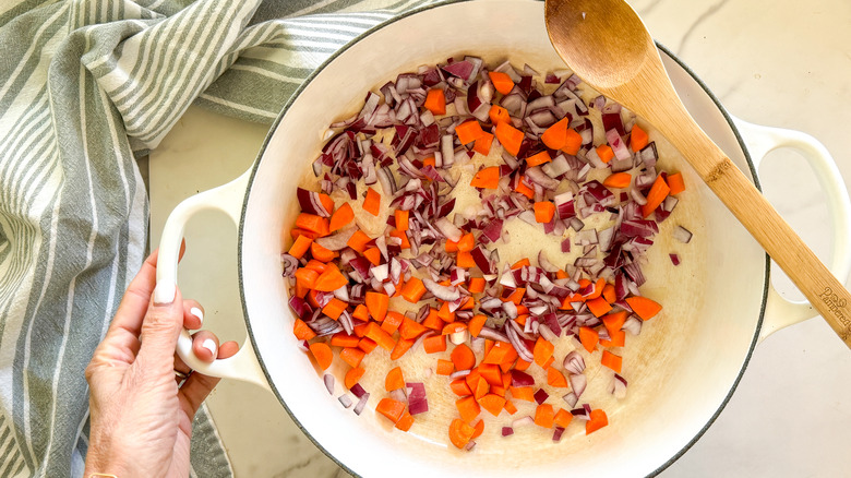 onions and carrots in pot