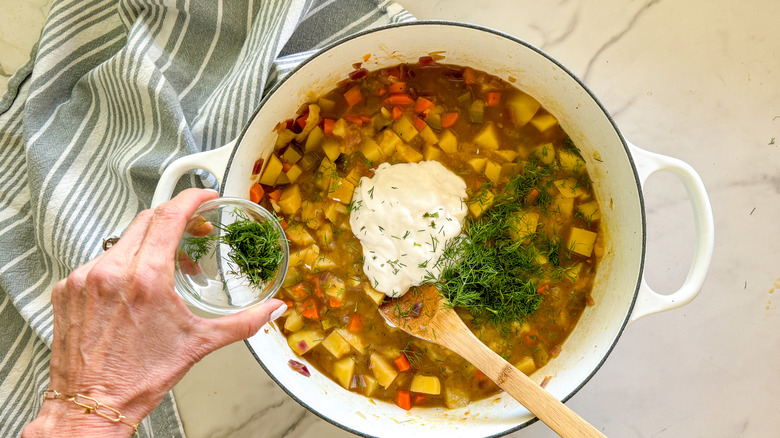 adding dill to pot