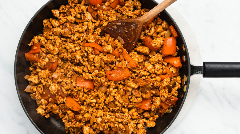 ground turkey and peppers in pan