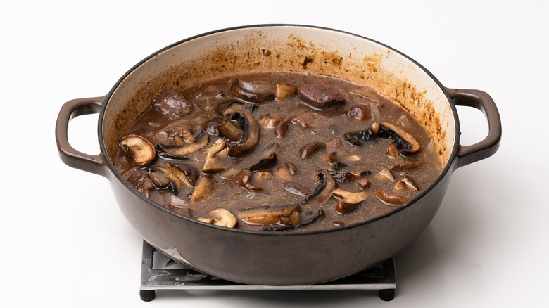 adding mushrooms to venison casserole