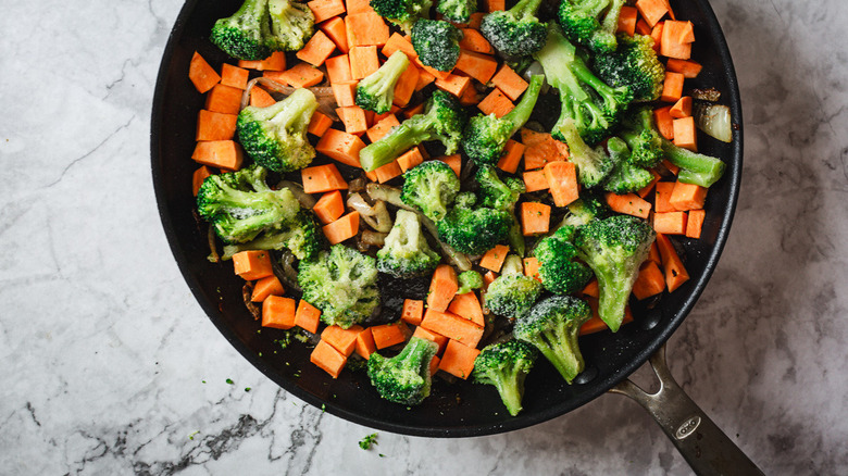 Broccoli and sweet potato in pan