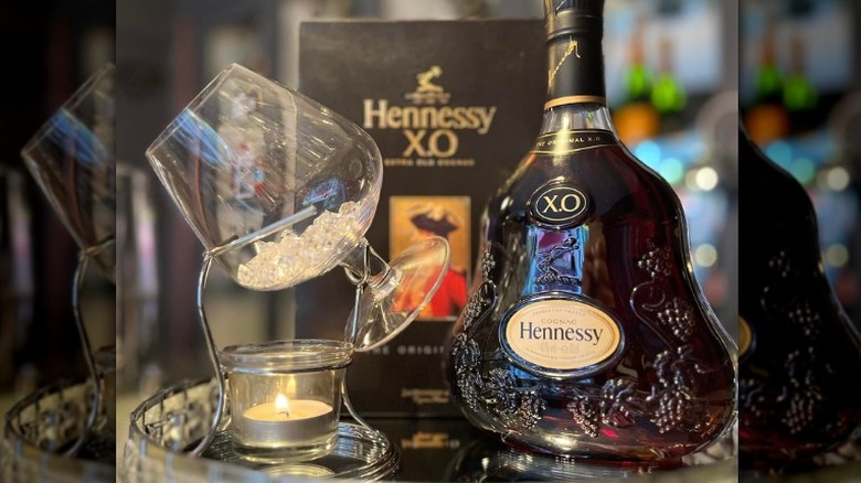 Hennessy X.O bottle, box, and snifter