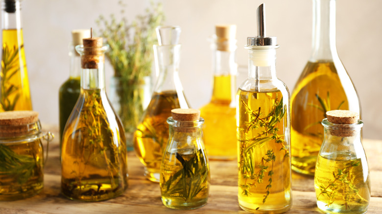 bottles of oil with herbs