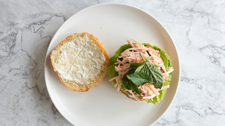 Open faced turkey burger on white plate