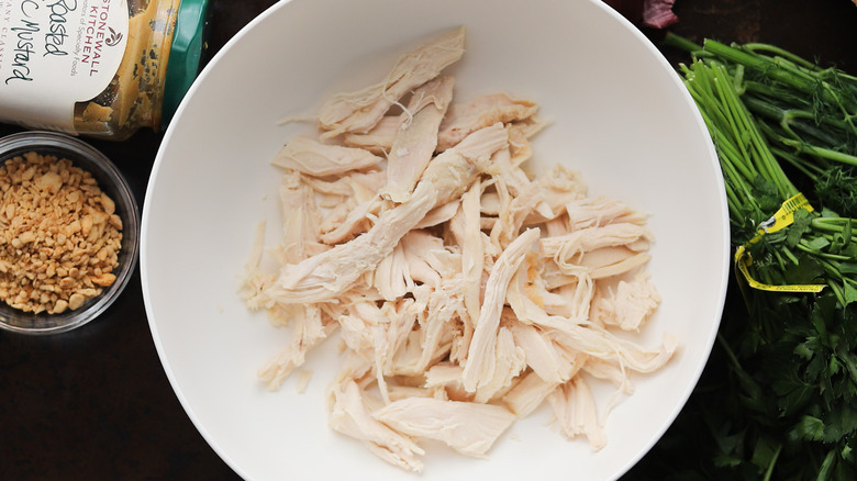 Bowl of shredded chicken chunks