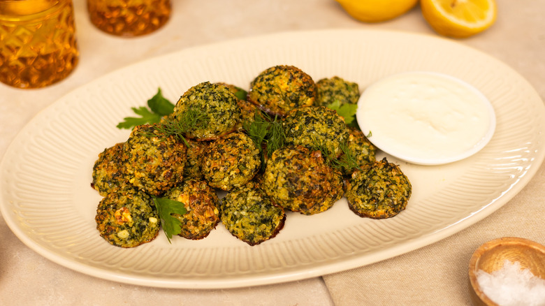 herby spinach quinoa balls on plate  