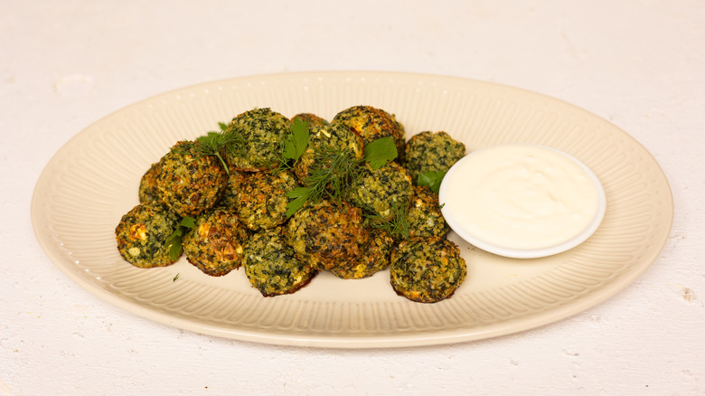 herby spinach quinoa balls on plate 