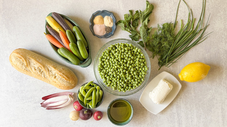 Herby spring pea dip ingredients on countertop