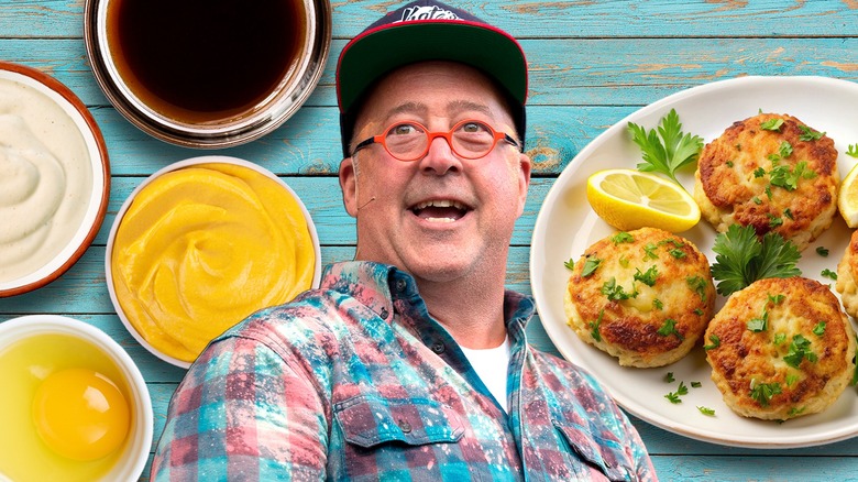 Chef Andrew Zimmern with crab cakes in the background