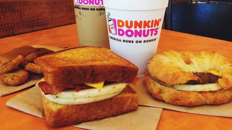 Dunkin' breakfast sandwiches and coffee cups