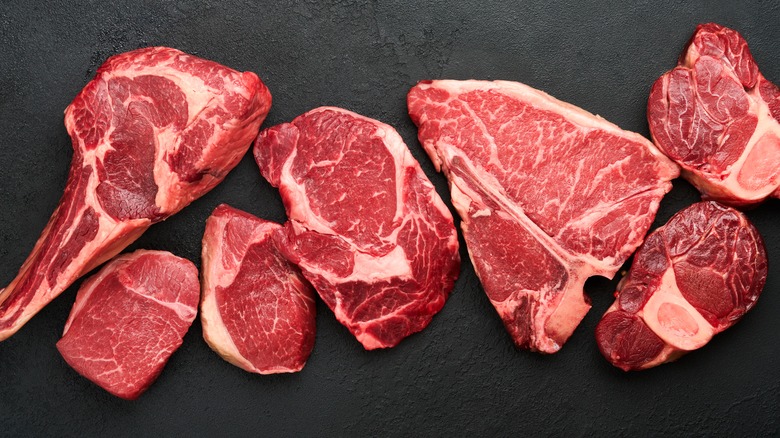 variety of raw steaks