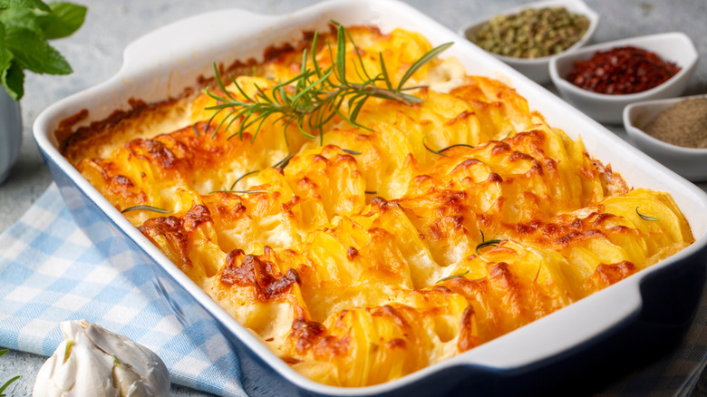 Scalloped potatoes in rectangular dish