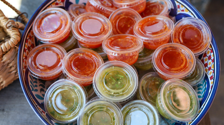 hot sauces in plastic containers