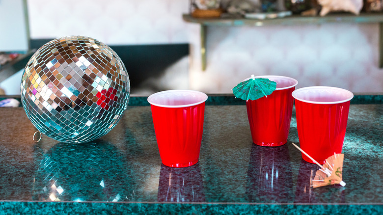 Cups next to a disco ball