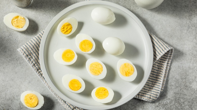 Two boiled eggs in water