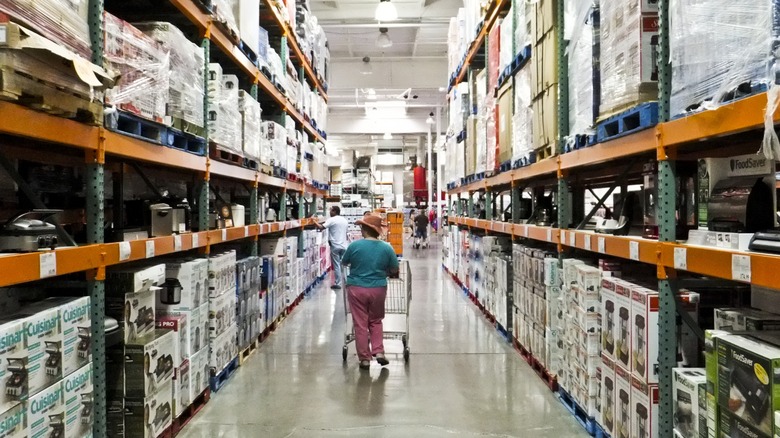 Shoppers in a Costco aisle