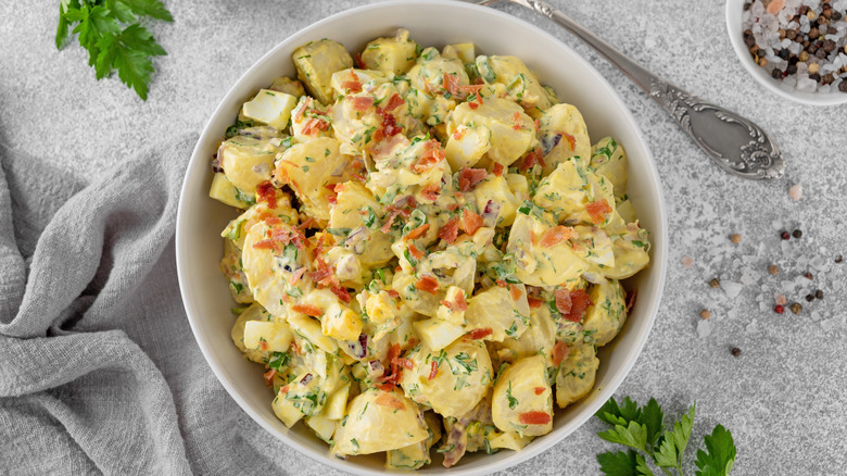 Potato salad in a white bowl