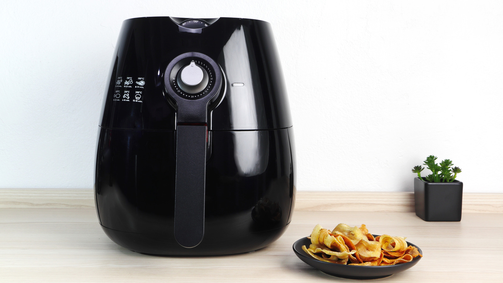 https://www.tastingtable.com/img/gallery/heres-how-to-prevent-your-air-fryer-from-smoking-from-greasy-foods/l-intro-1648061543.jpg