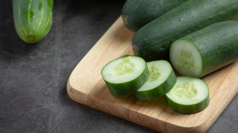 cucumbers sliced on cutting board