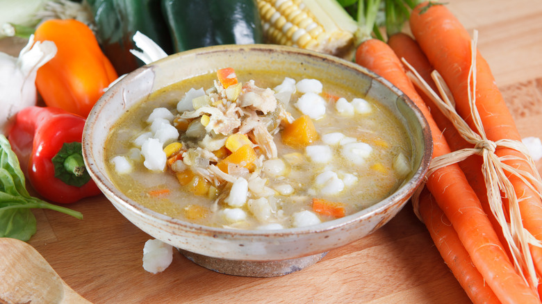 bowl of soup with hominy