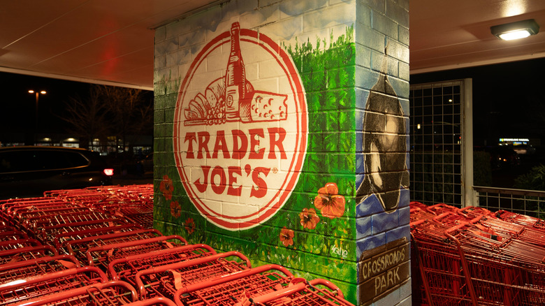 Trader Joe's logo painted on a column in the parking lot