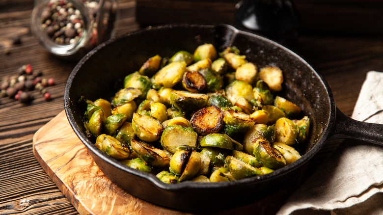 Roasted brussels sprouts in a cast iron pan