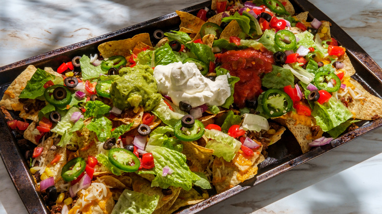 Nachos on baking sheet