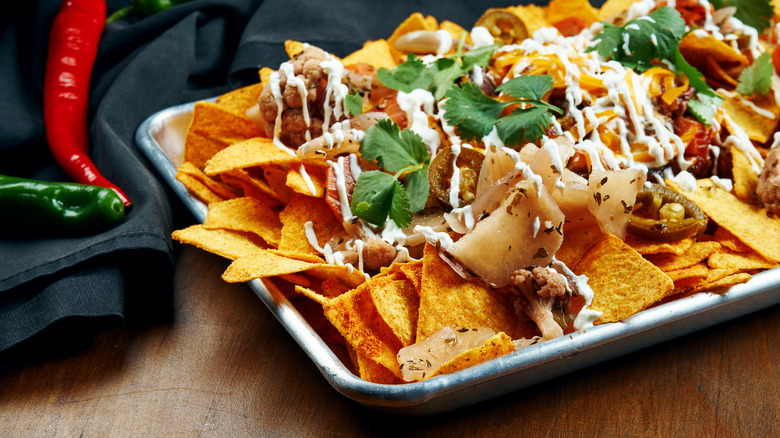 Nachos on baking sheet