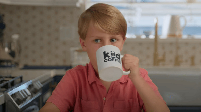 A boy in an advert sips Kiid Coffee