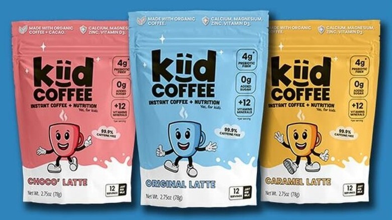 A triple pack of Kiid Coffee in pink, blue, and yellow