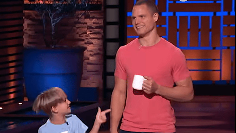 Ethan points jokingly at his dad, David