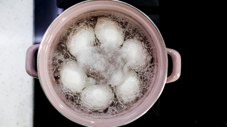 eggs boiling in pot