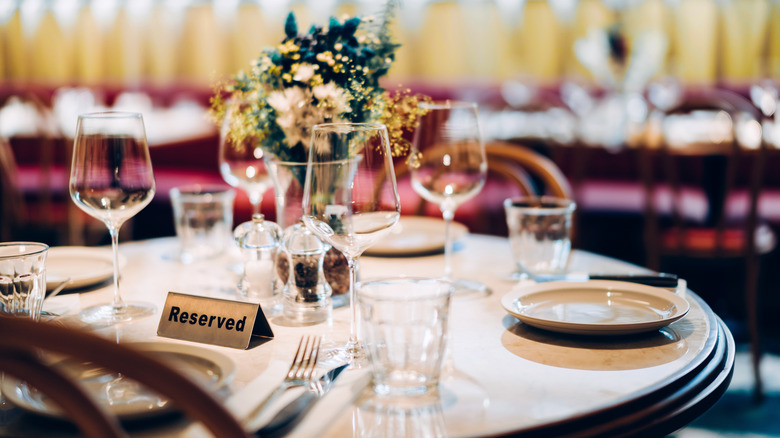 Restaurant reservation sign on table