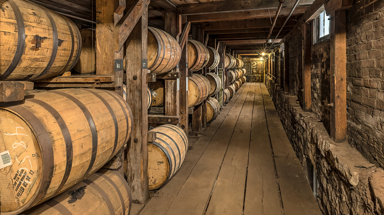 long hallway of bourbon barrels