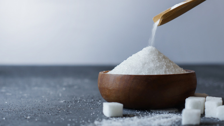 granulated sugar poured into bowl