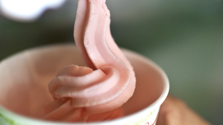 frozen yogurt pumped from a soft serve machine