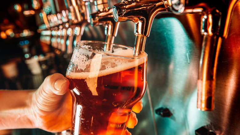 Beer being poured from tap