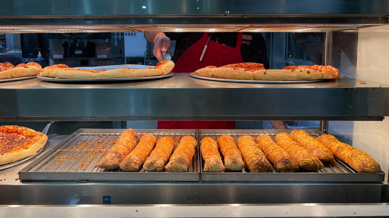 Pizzas and chicken bakes on display at Costco