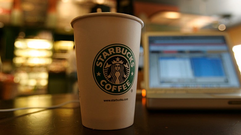 Starbucks coffee cup on the store counter