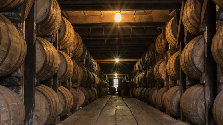 Barrels in bourbon aging warehouse