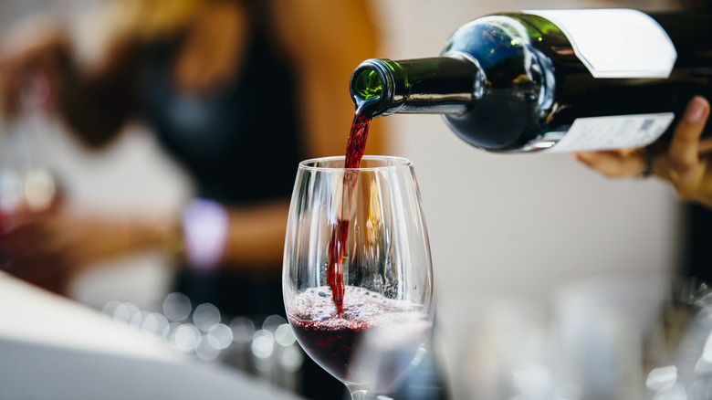 red wine poured into a wine glass